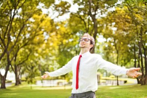 businessman refreshing in autumn park or forest